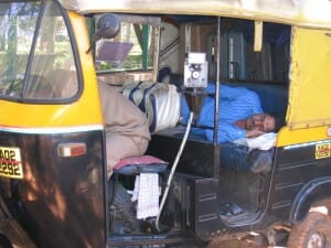 rickshaw driver taking a nap in Bangalore