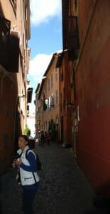 Micaela pointing out Roman ghetto street