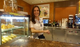 Captain Kate McCue serving passengers at Cafe al Bacio on the Celebrity Summit